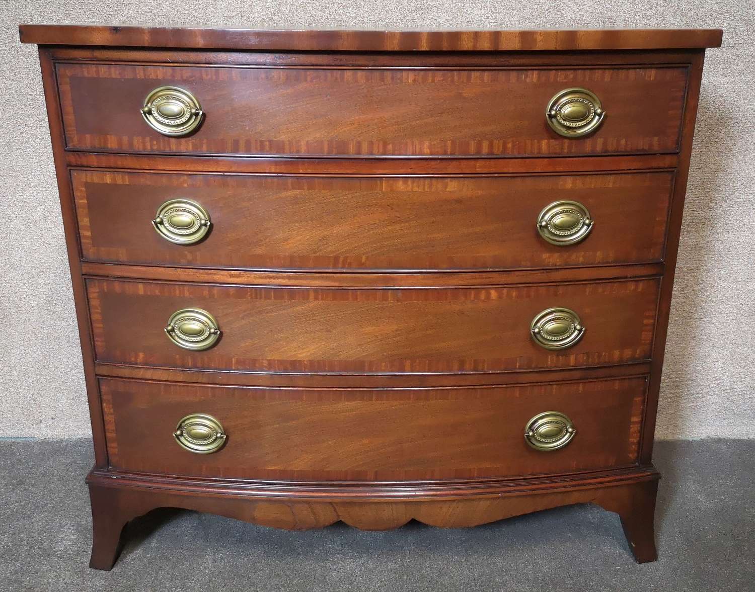 Reproduction Mahogany Bow Front Chest of Drawers In The Georgian Style