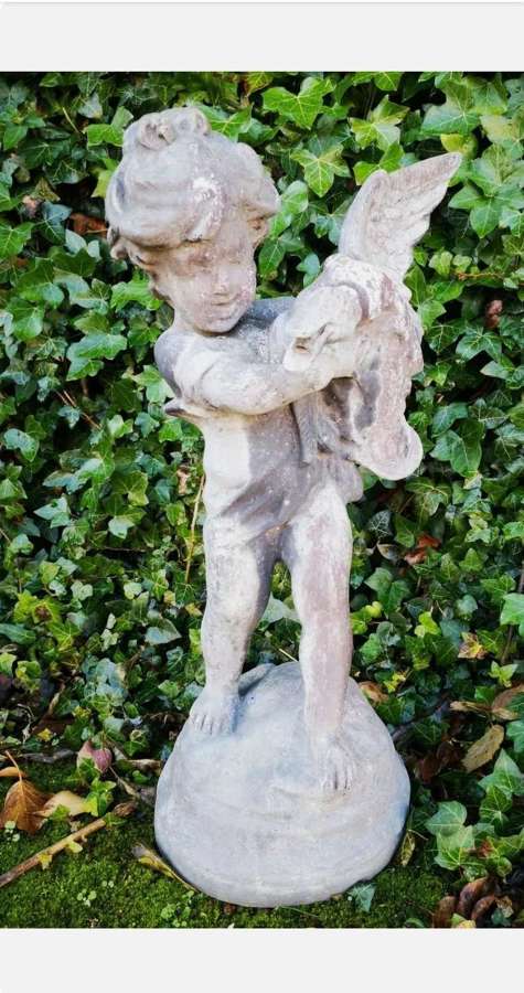 Antique Lead Figure of A Boy Holding A Goose