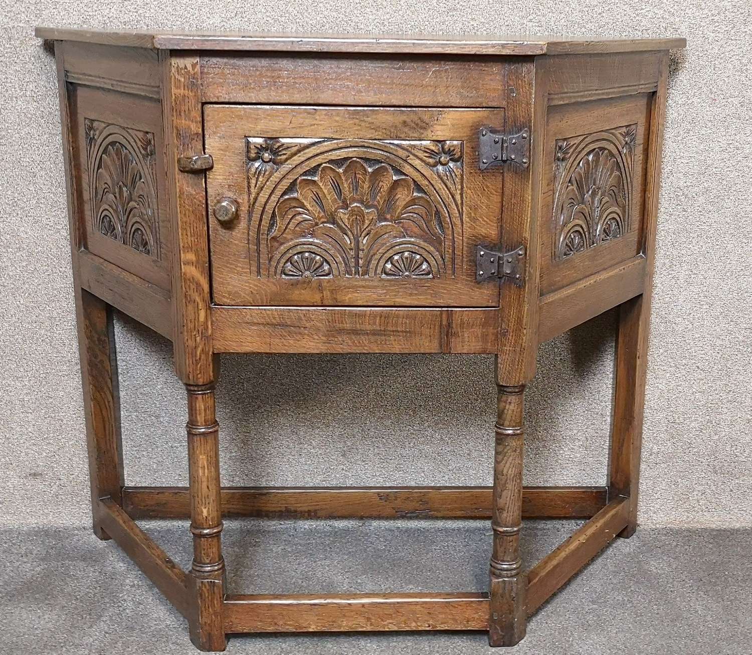 Oak Canted Cupboard - Carved Decoration