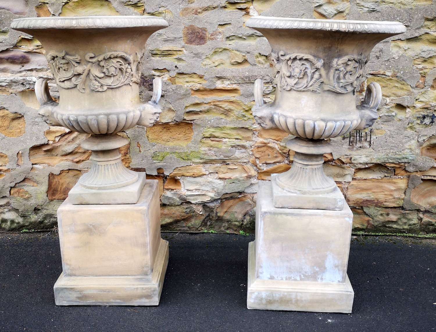 Large Pair of Georgian Style Stone Urns On Plinths