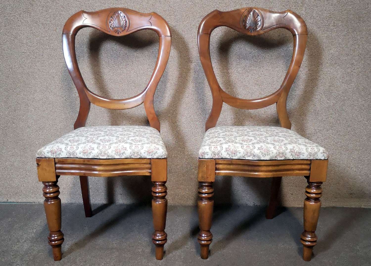 A Pair of Victorian Carved Mahogany Balloon Back Dining Chairs