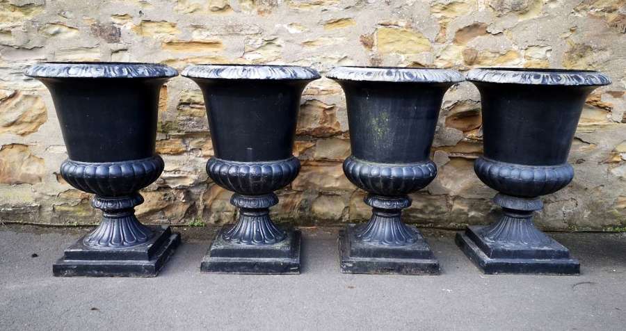 Set of Four Antique Cast Iron Garden Urns