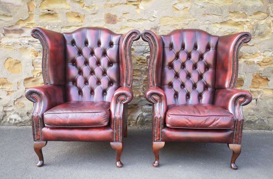 Pair of Queen Anne Leather Chesterfield High Back Armchairs
