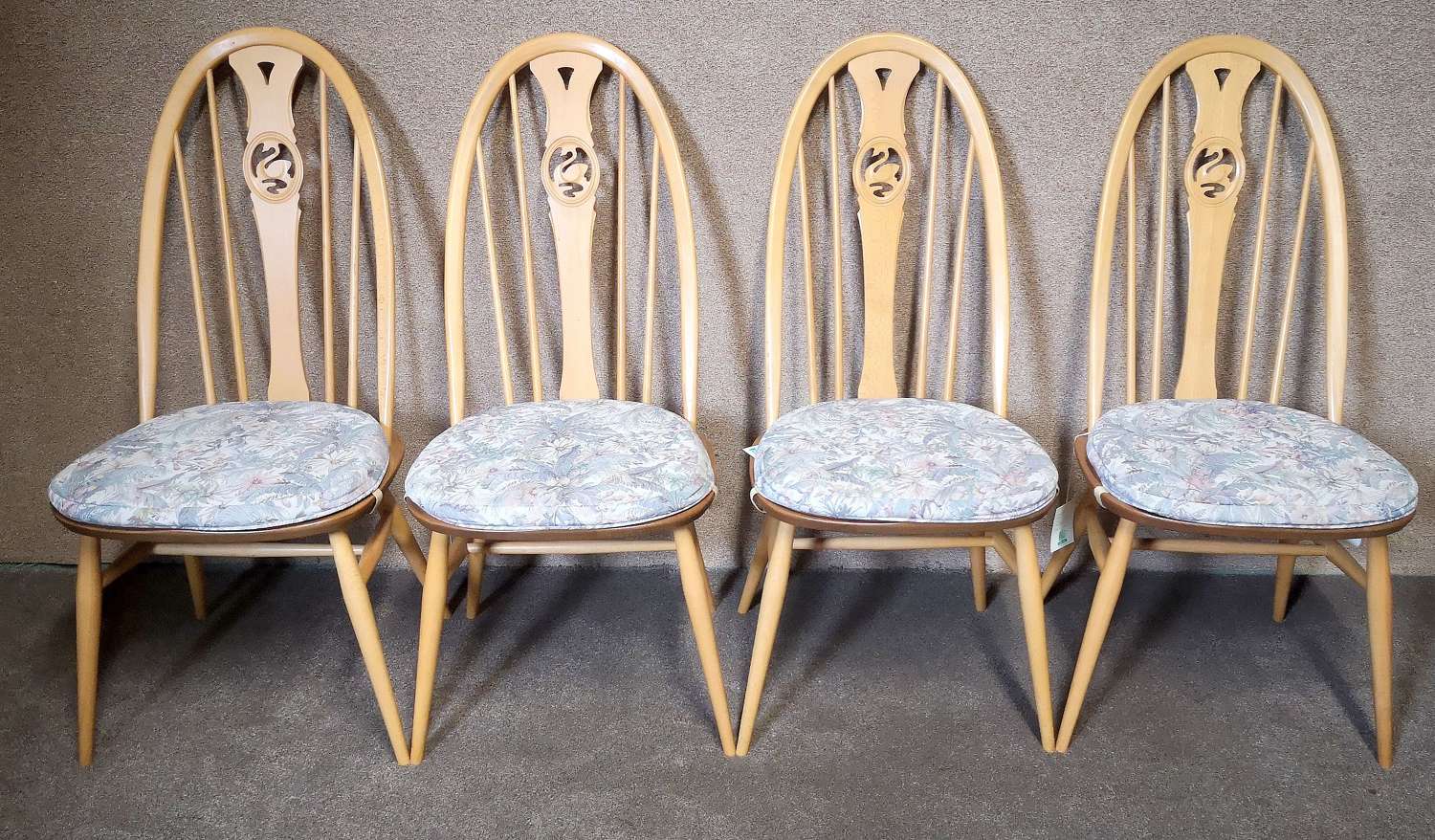 A Set of Four Ercol Swan Back Kitchen - Dining Chairs