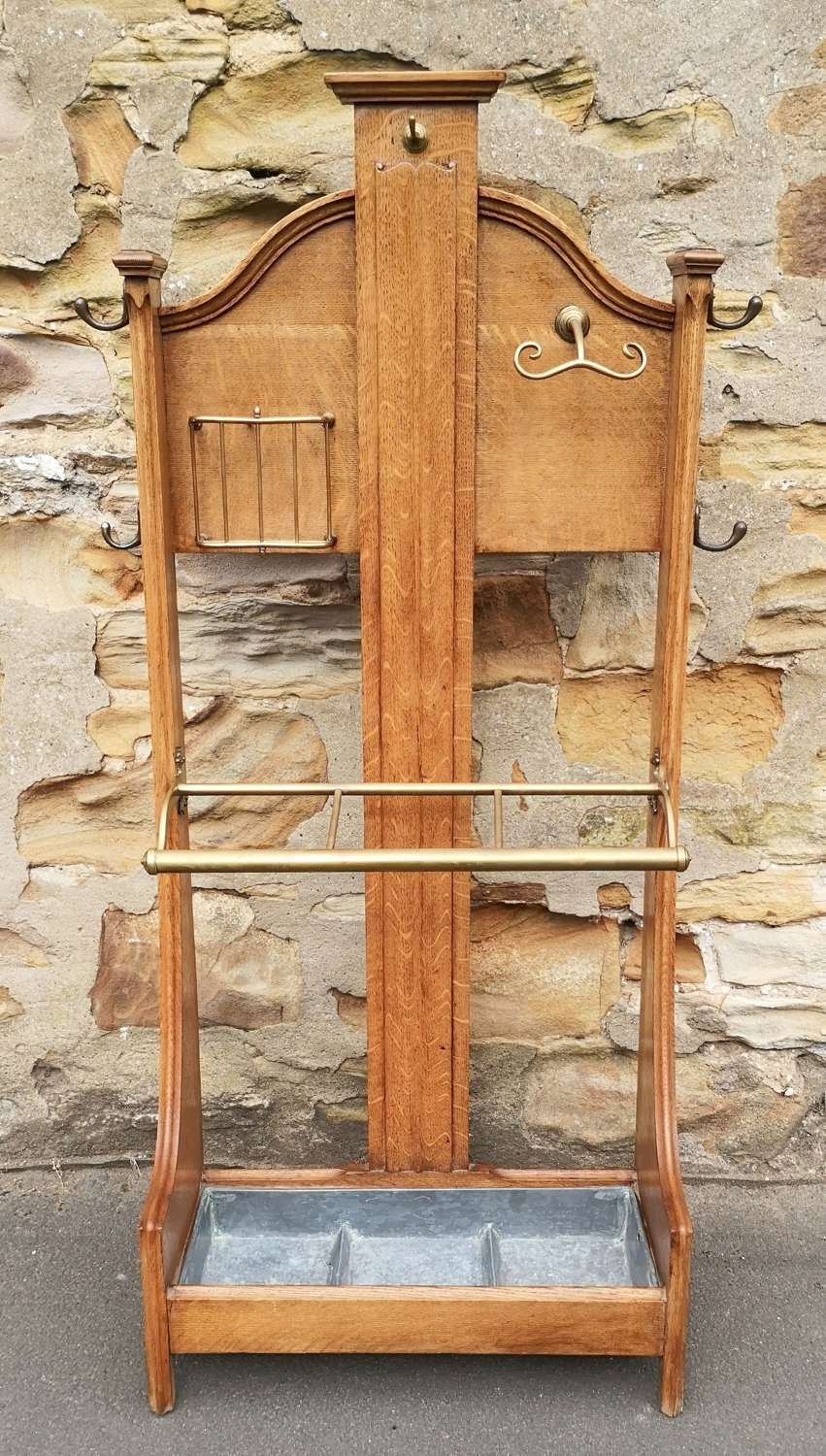 An Early Twentieth Century Oak and Brass Stick Stand